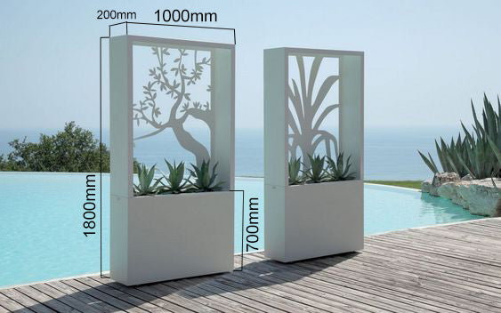 Decorative planters with cut-out designs by a poolside