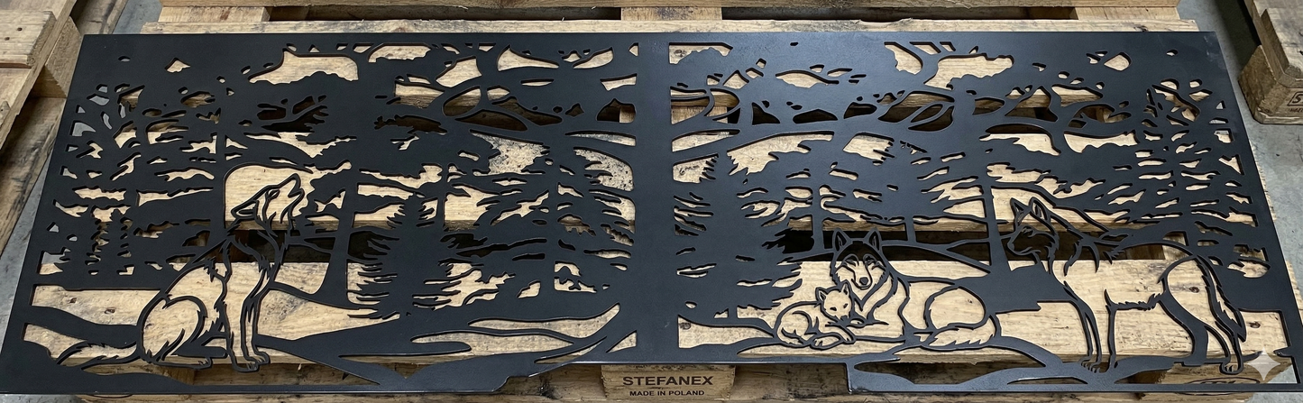  Real metal panel freshly cut with a laser machine, showing the intricate wolf pack and forest silhouette before assembly.