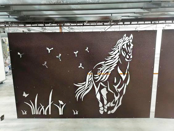 Decorative metal panel with a horse design on a brown background